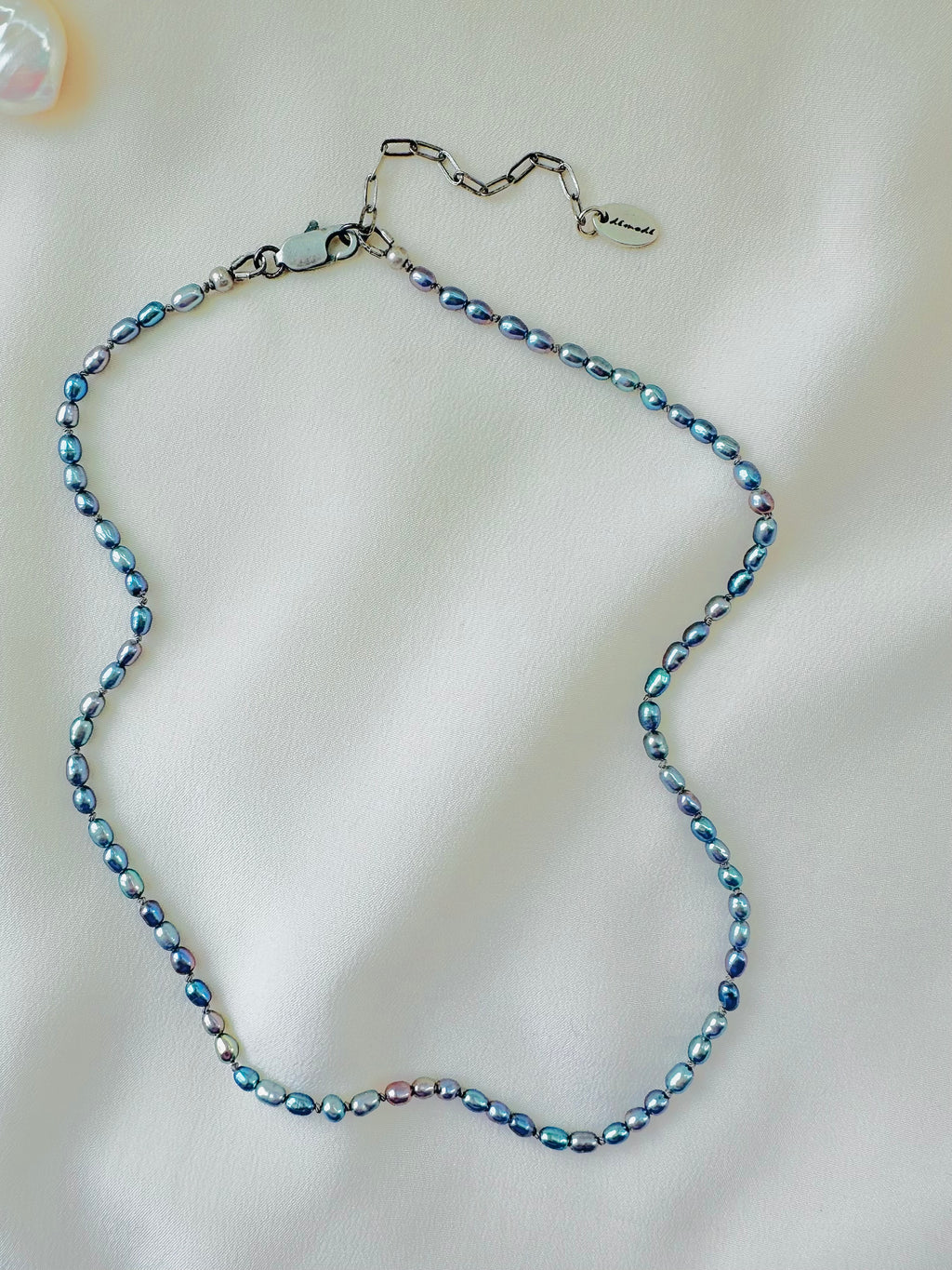 Pearl necklace on a white background